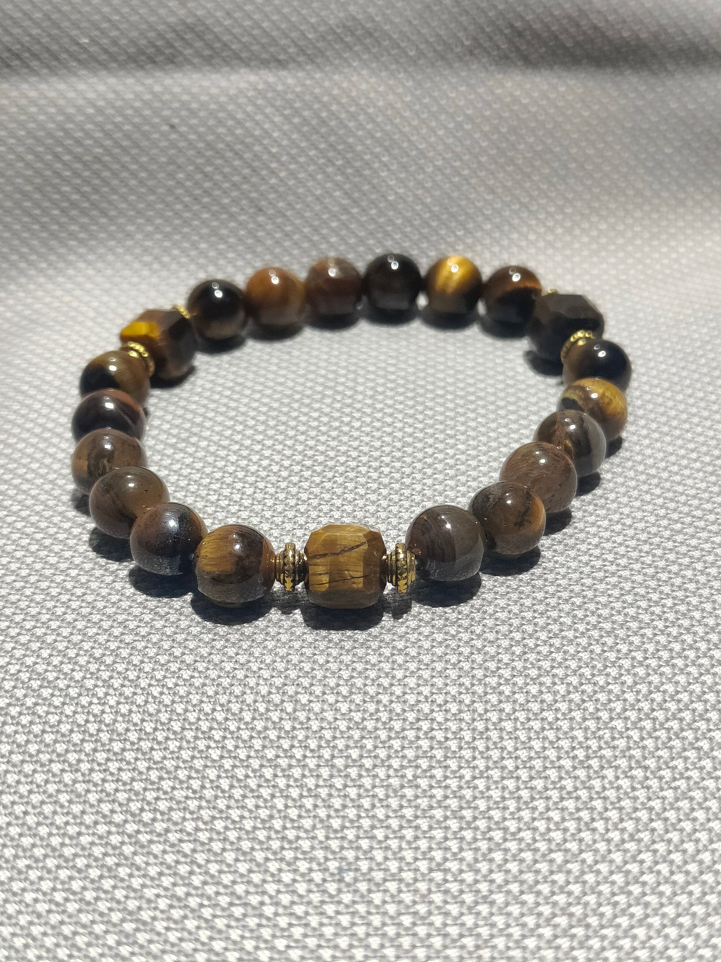 Energised fancy tiger eye bracelet